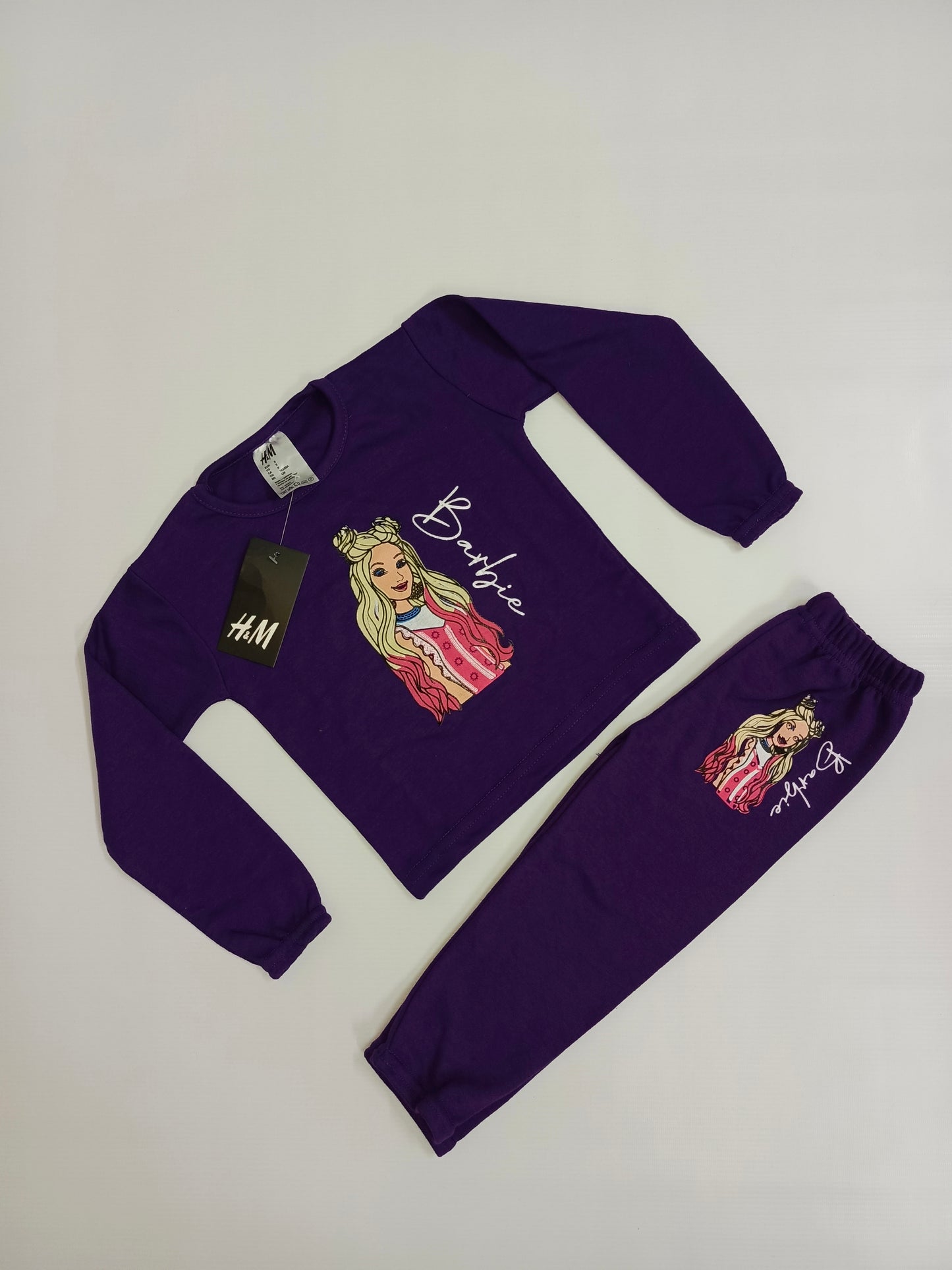 Purple barbie doll tracksuit