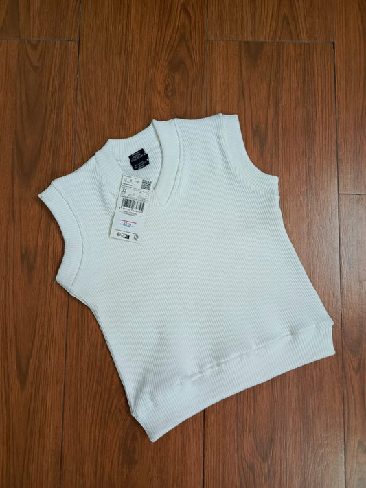 White sleeveless sweater