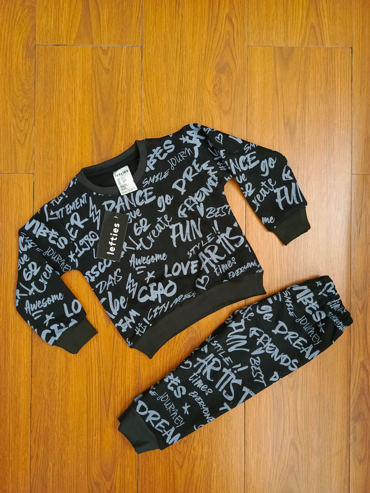 Black writing kids tracksuit